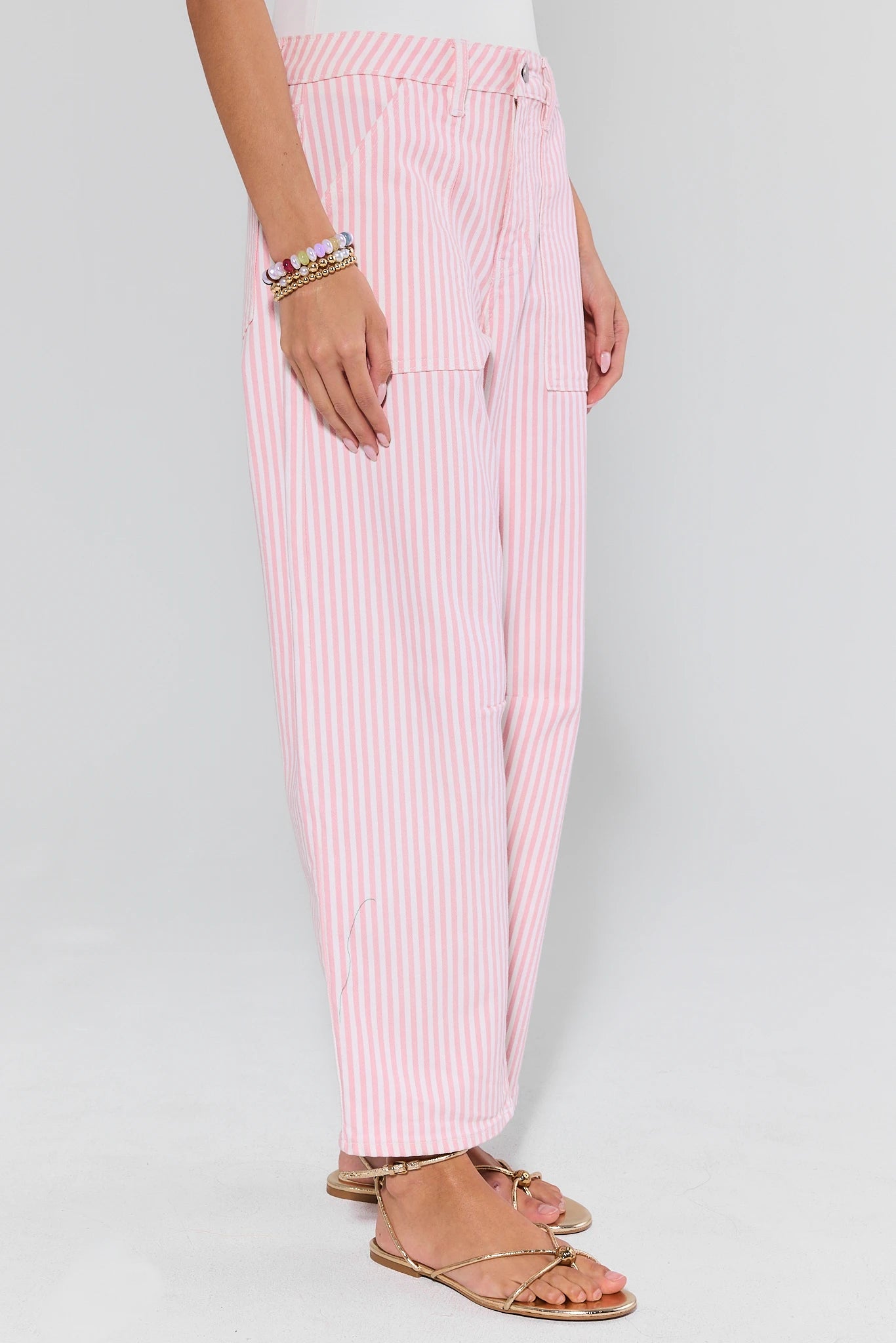 View 3: Pink striped pants worn by a person on a white background