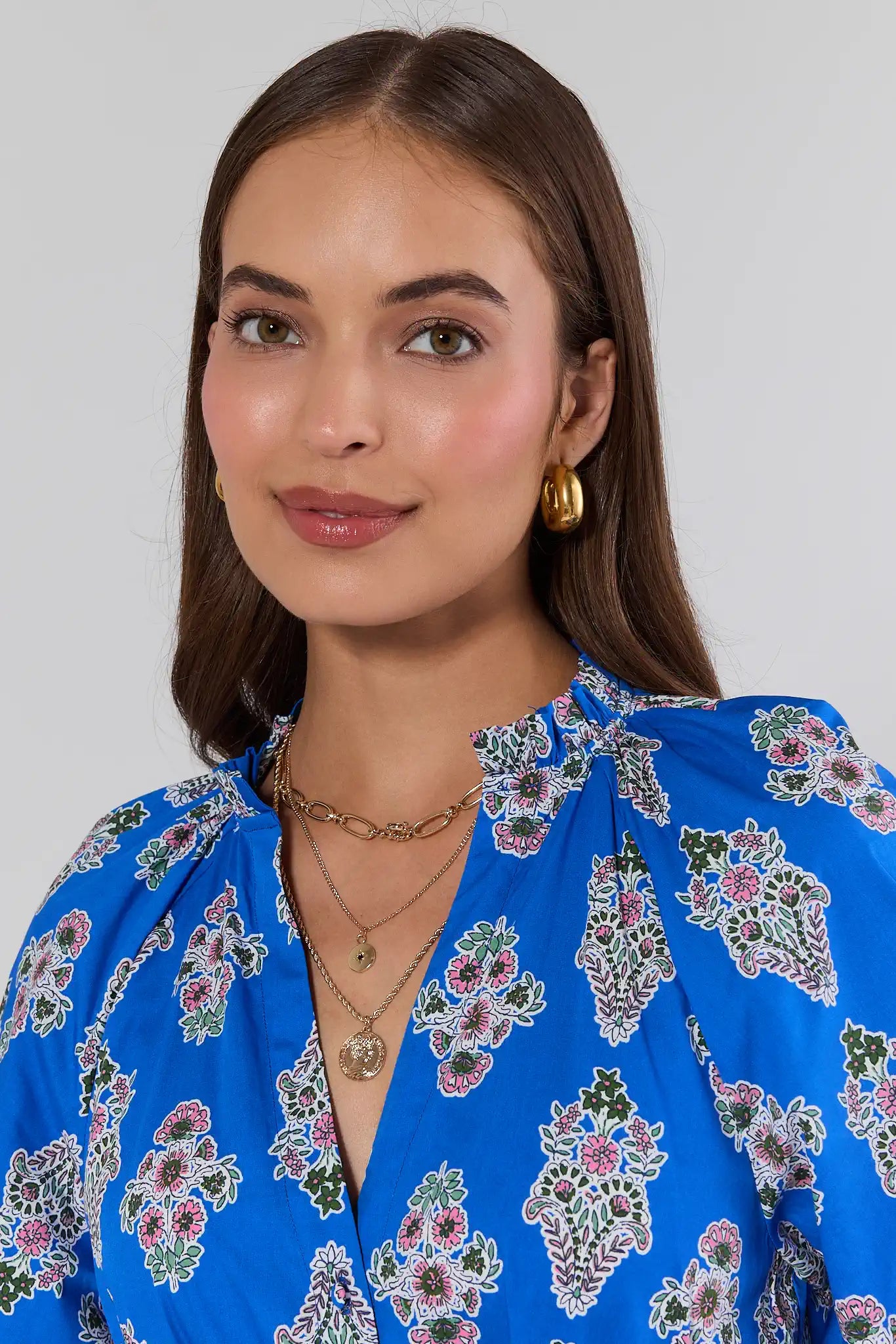 woman wearing Waverly Gold Coin Layered Necklace on white background