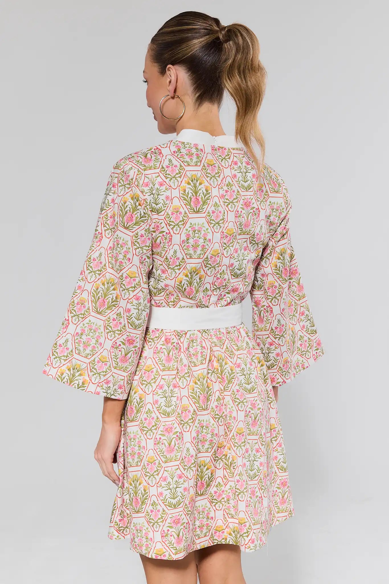 back shot woman wearing floral cameron dress