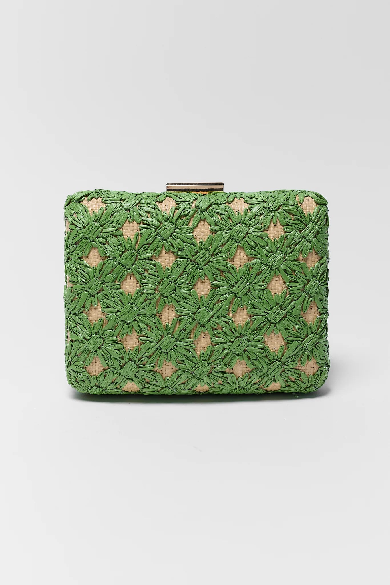 Green woven clutch bag on a light gray background