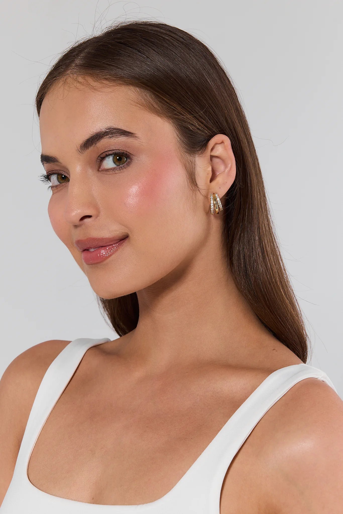 woman wearing Lexi Rhinestone Hoop Earrings