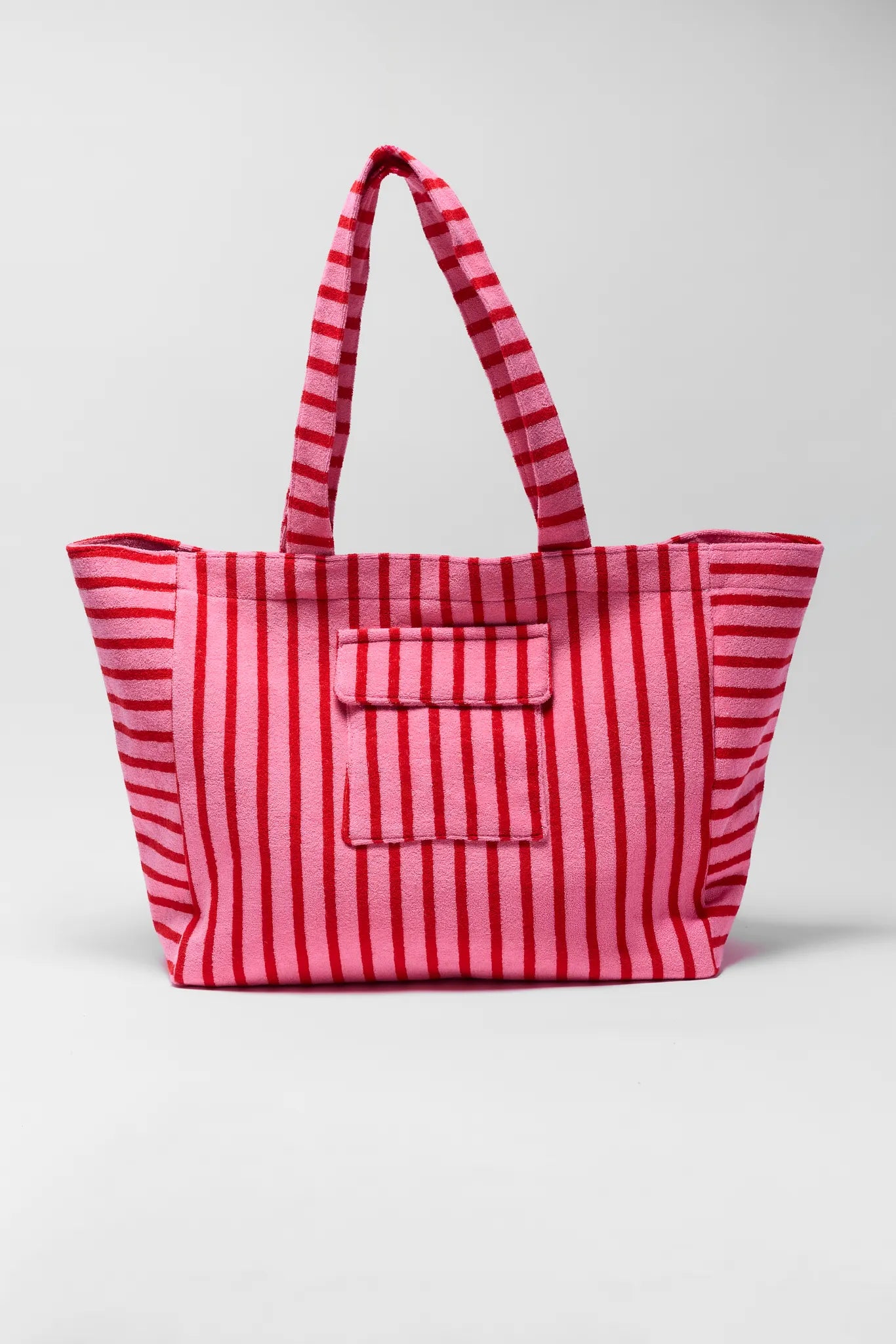 Red and white striped tote bag on a light gray background