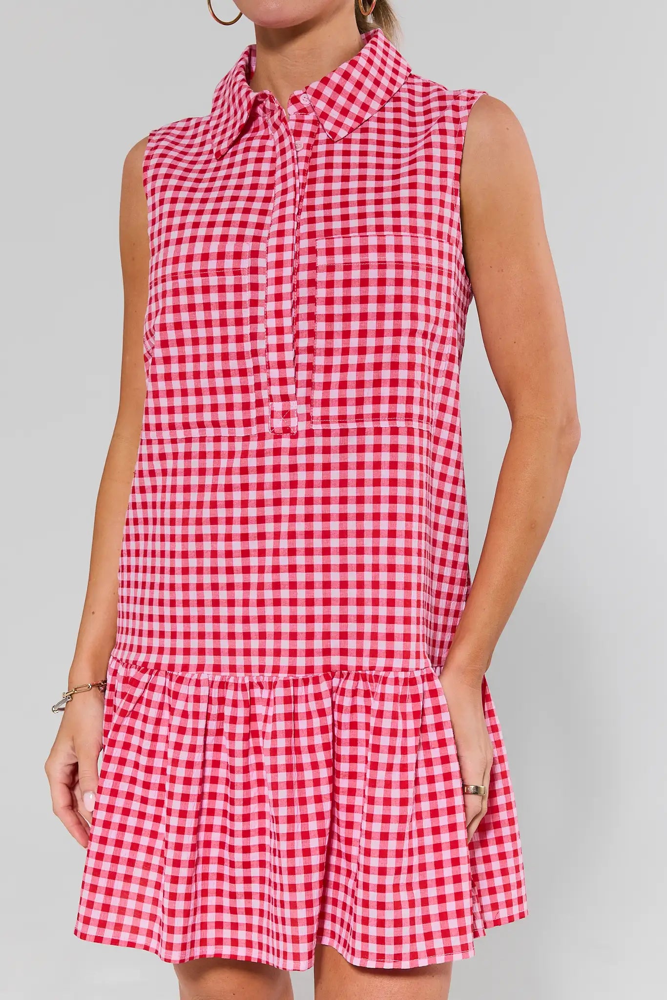 close up Red and white checkered dress on a plain background