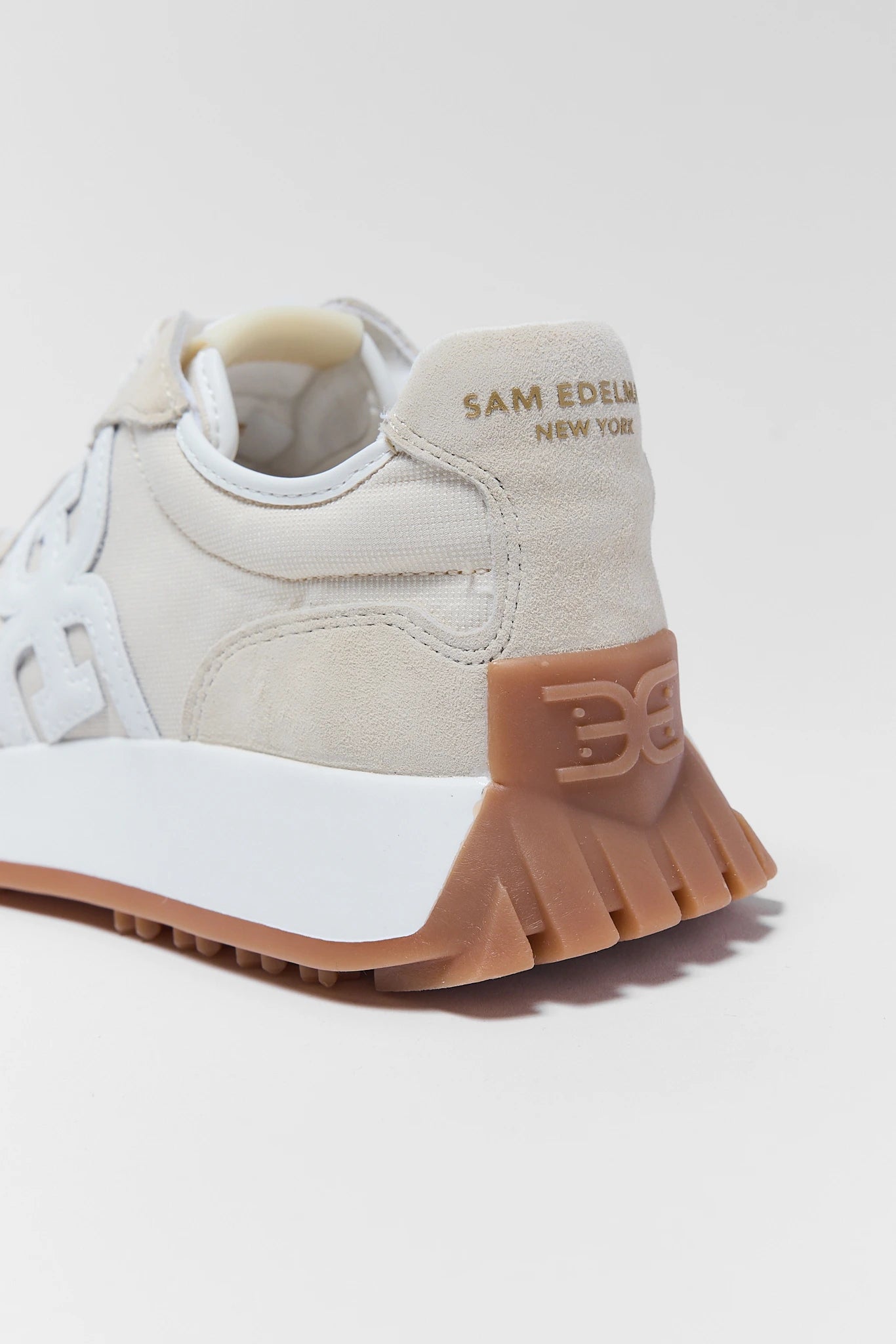 backside of langley ivory sneakers by sam edleman on white background