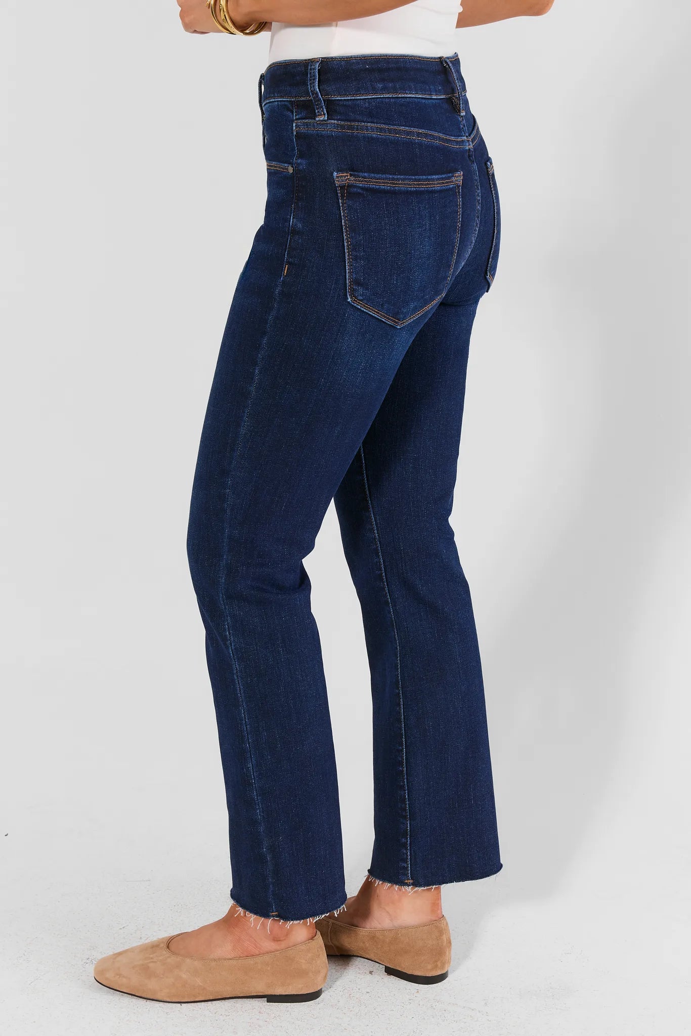 Becca Dark Wash Kick Flare Cropped Jeans - Side Profile with Raw Hem Detail | Avara