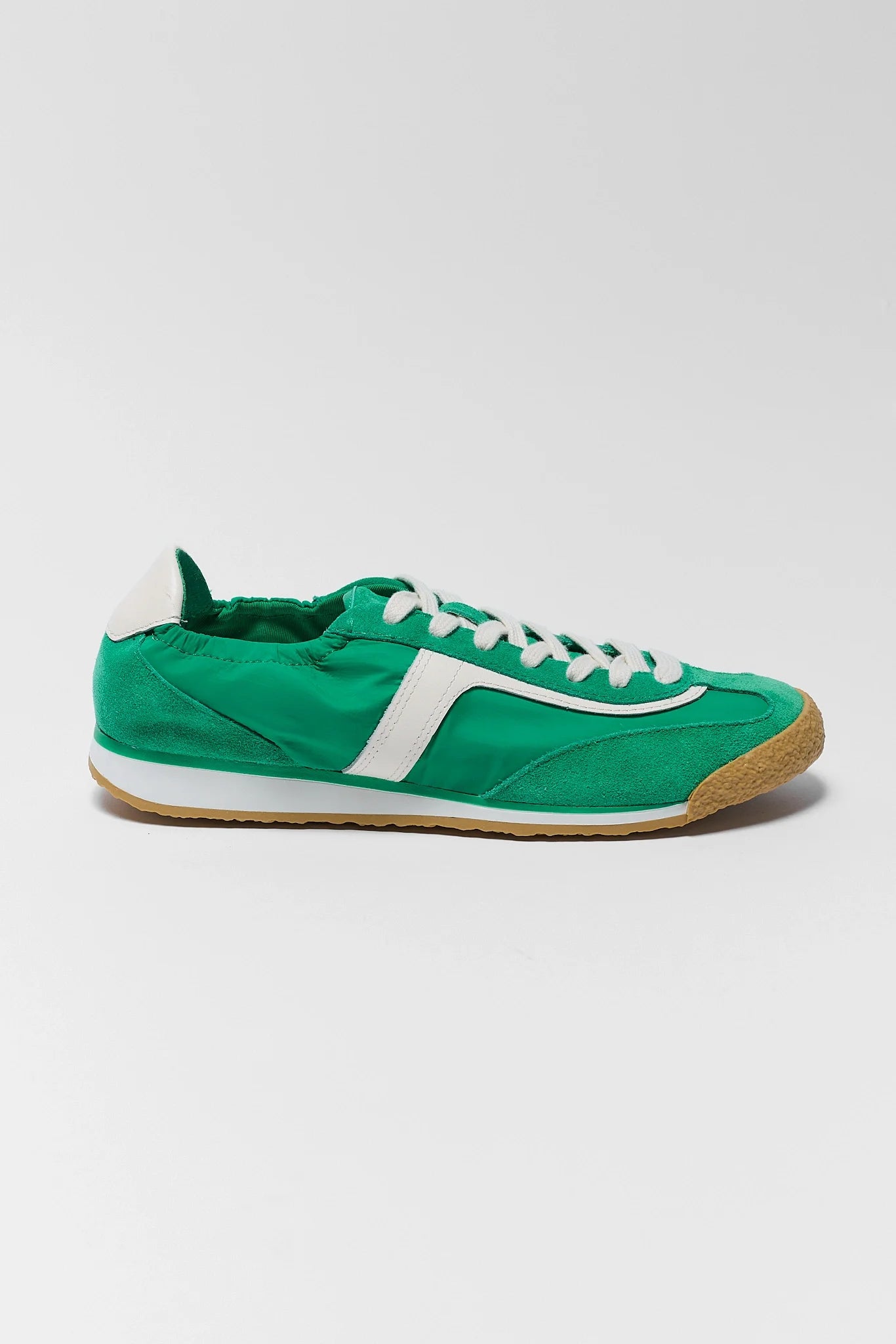 one green Dolce Vita sneaker