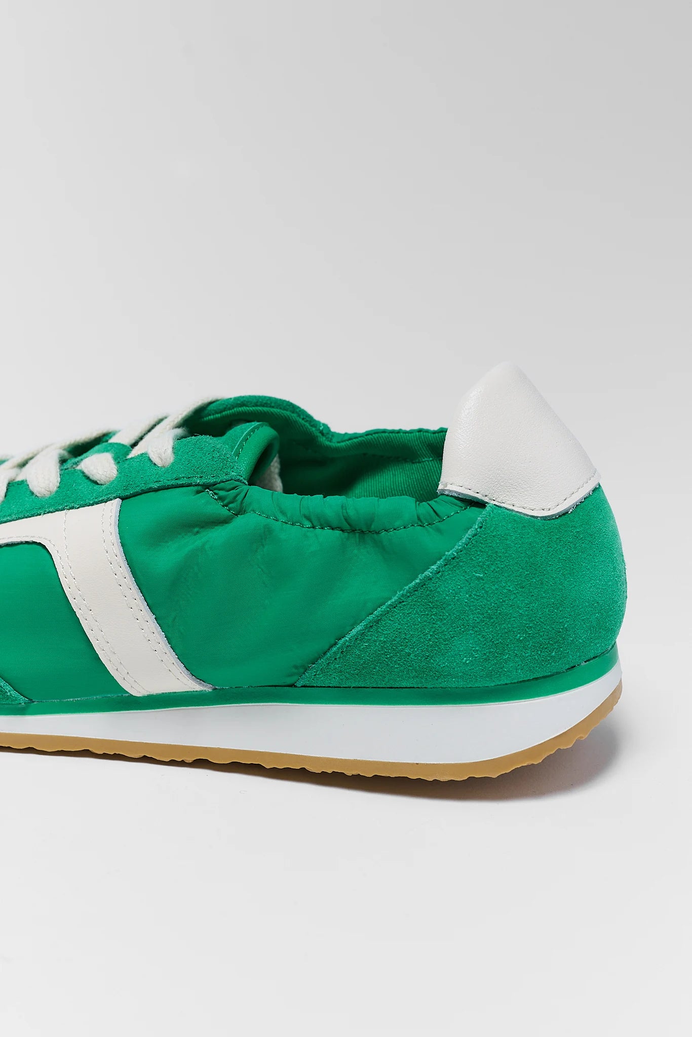 close up of green Dolce Vita sneaker
