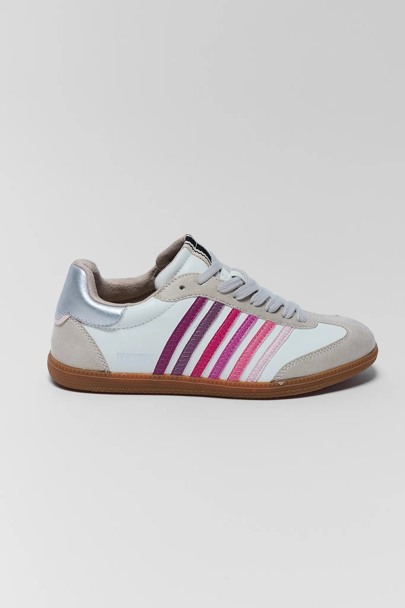 one Sneaker with pink and purple stripes on a light gray background