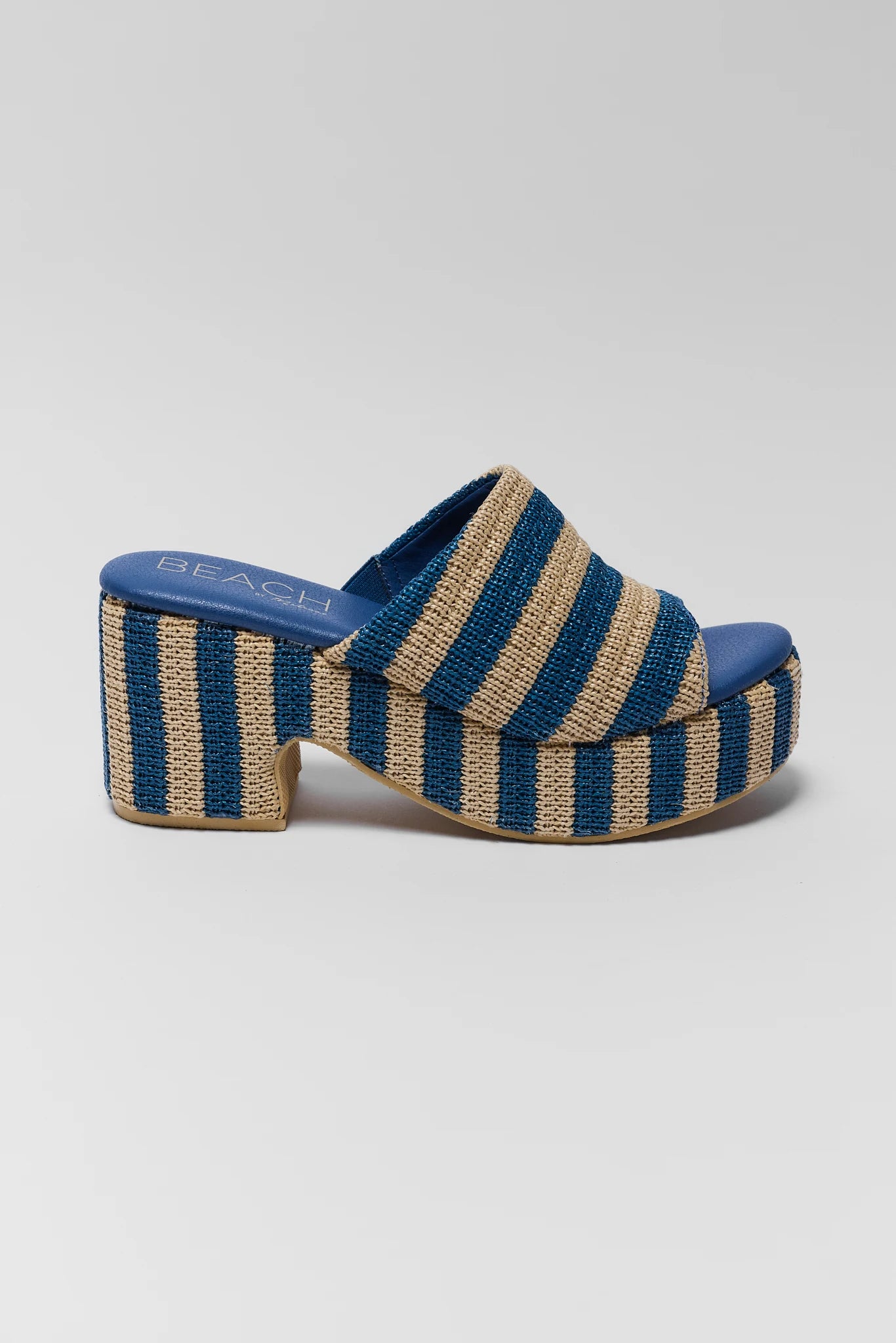 Blue and beige striped sandal on a white background one