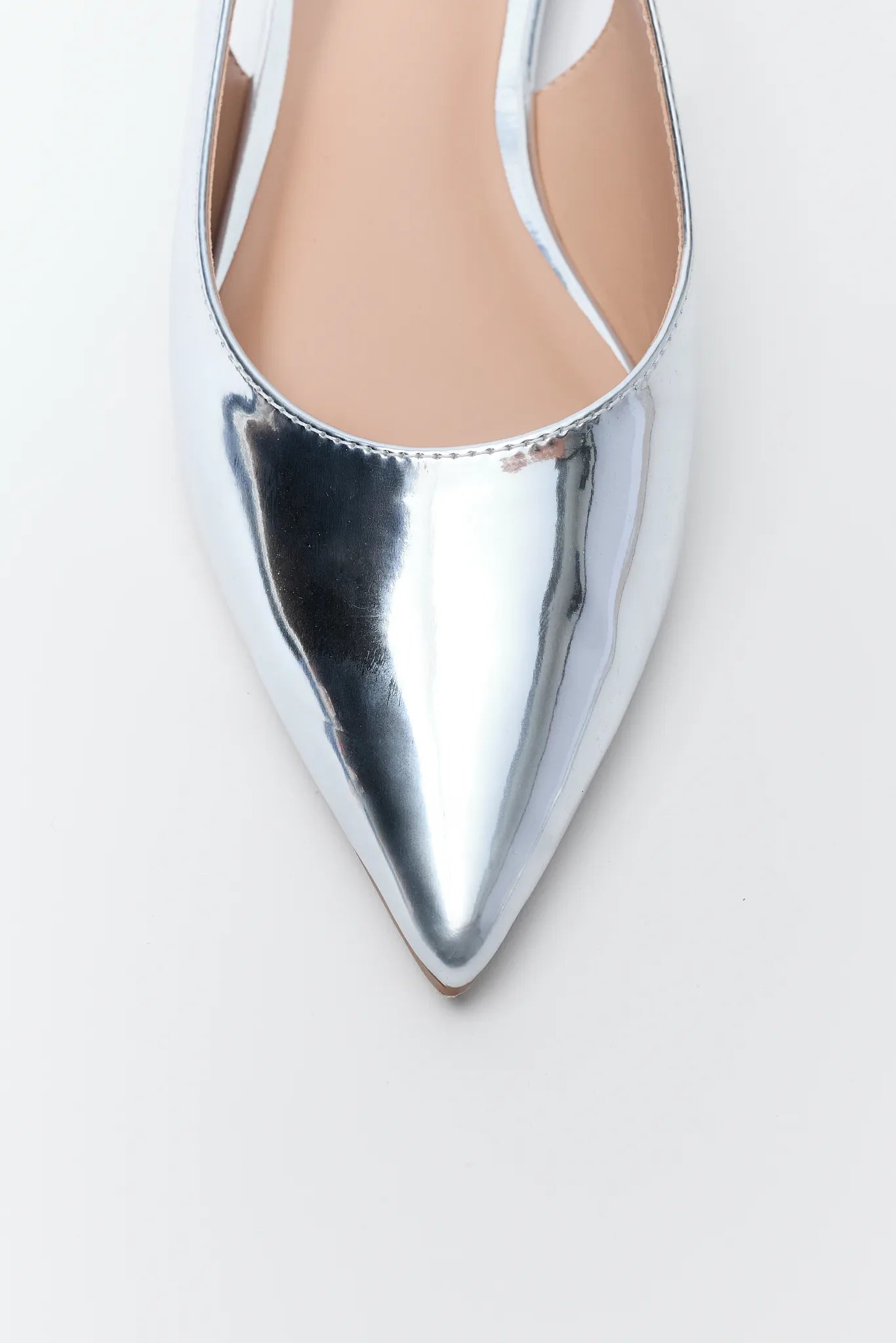 Sylvia Silver Metallic Flats on a white background
