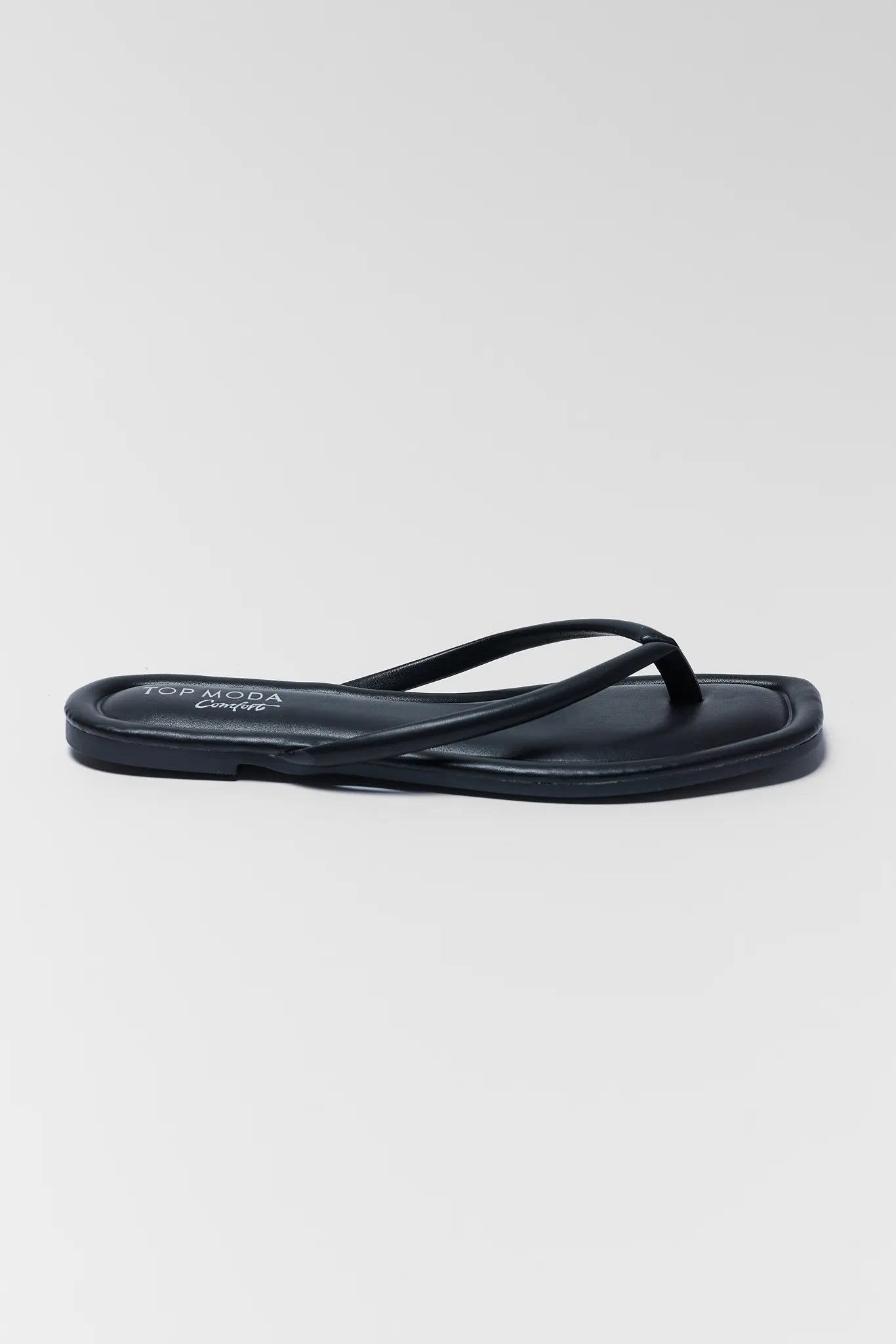 Black sandal on a white background