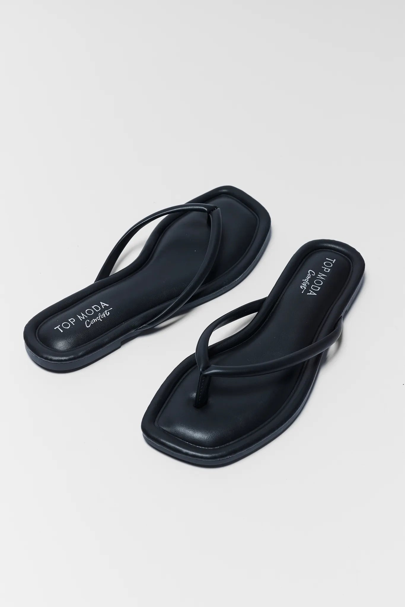 Black sandals on a white background