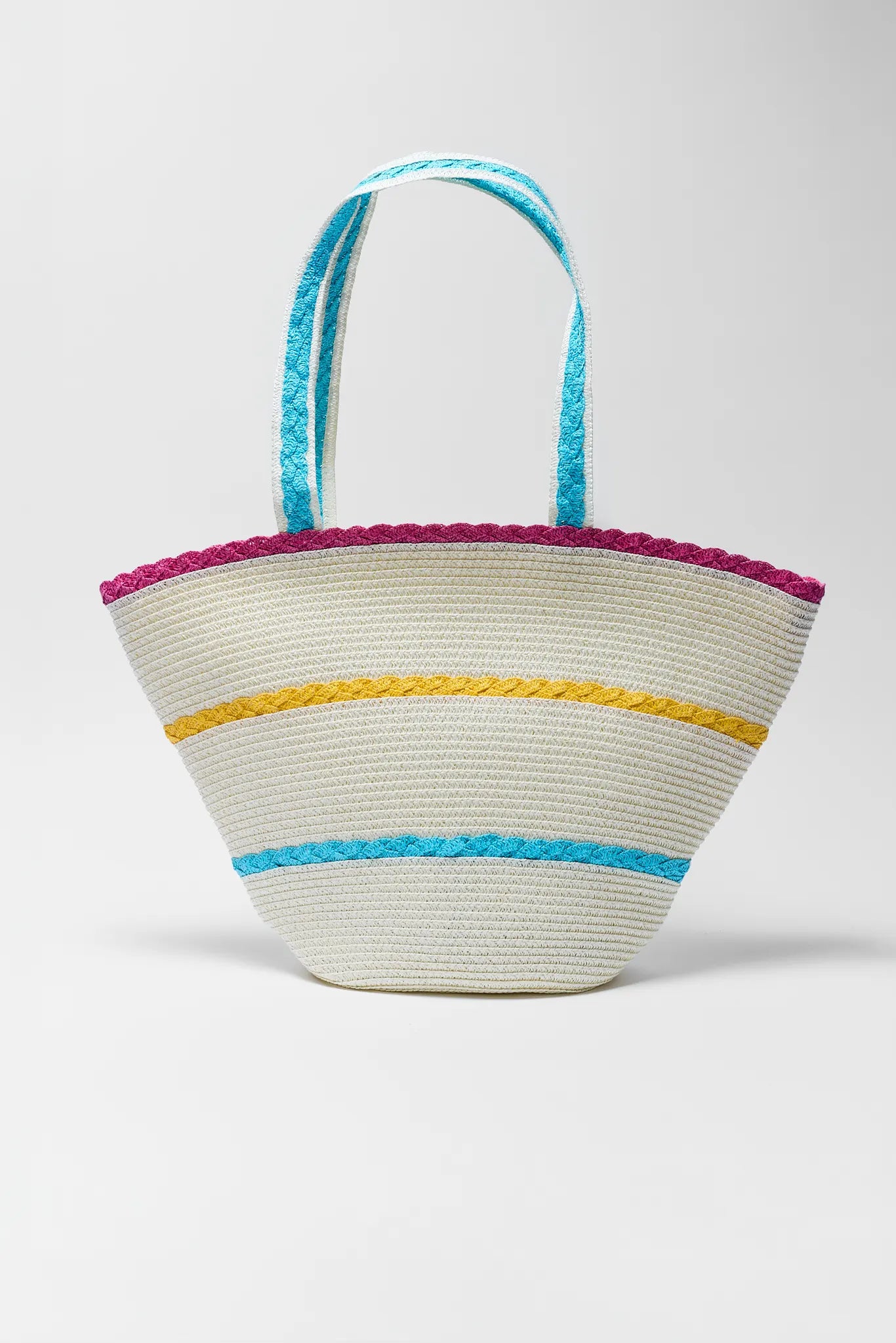 Woven basket with colorful handles and trim on a white background close