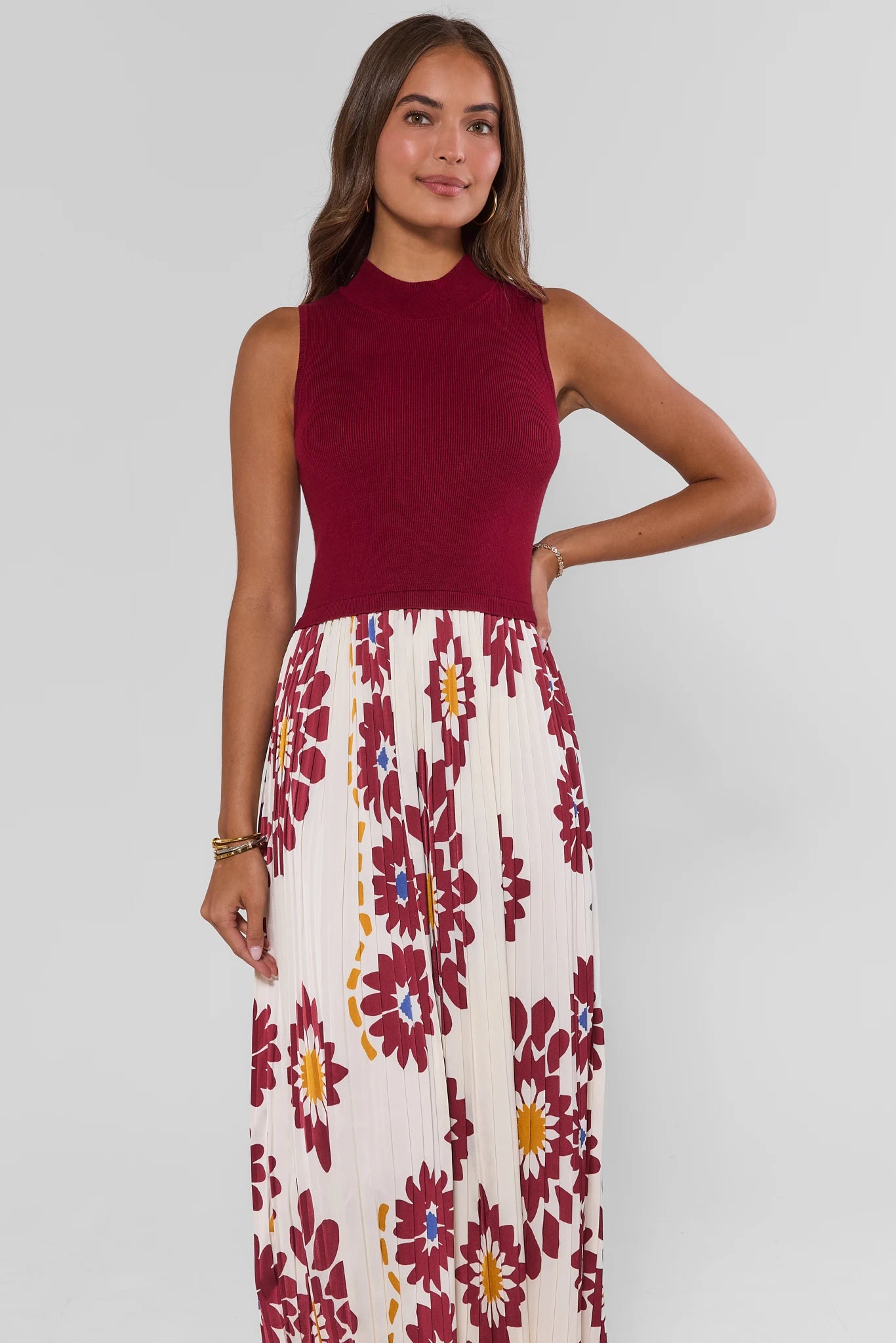 woman wearing marcia burgundy dress on white background