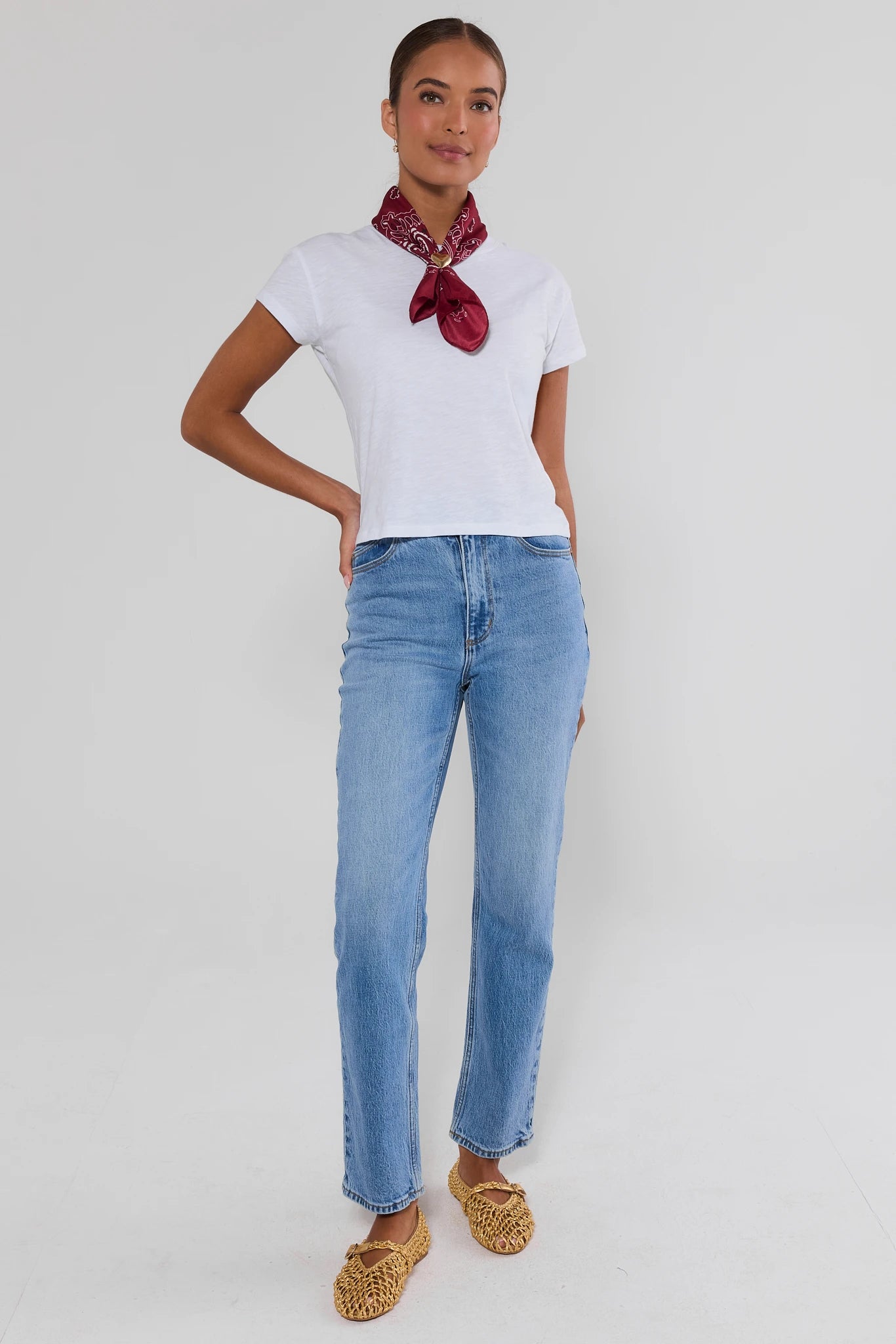  woman wearing white modern slub tee and scarf on a white background
