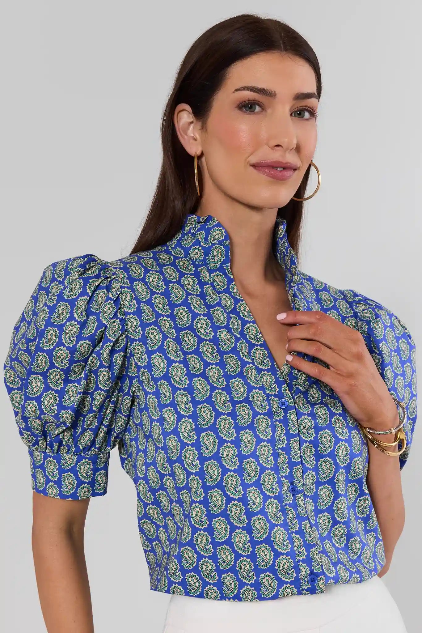 Woman wearing Gracie Navy Paisley Print Top with details on white background