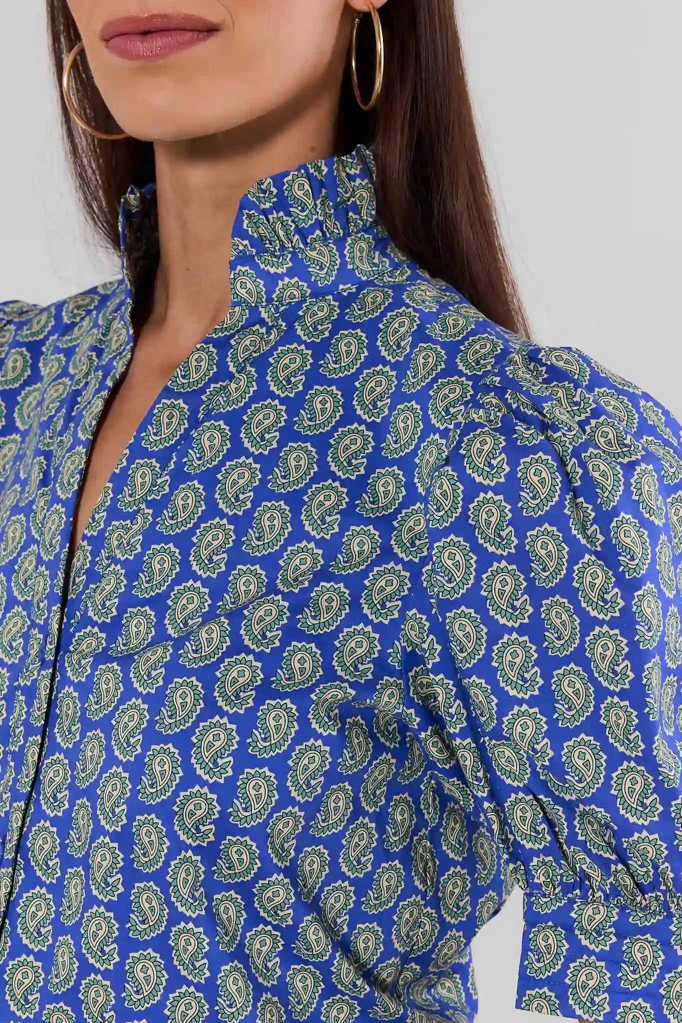 Close up Woman wearing Gracie Navy Paisley Print Top on white background