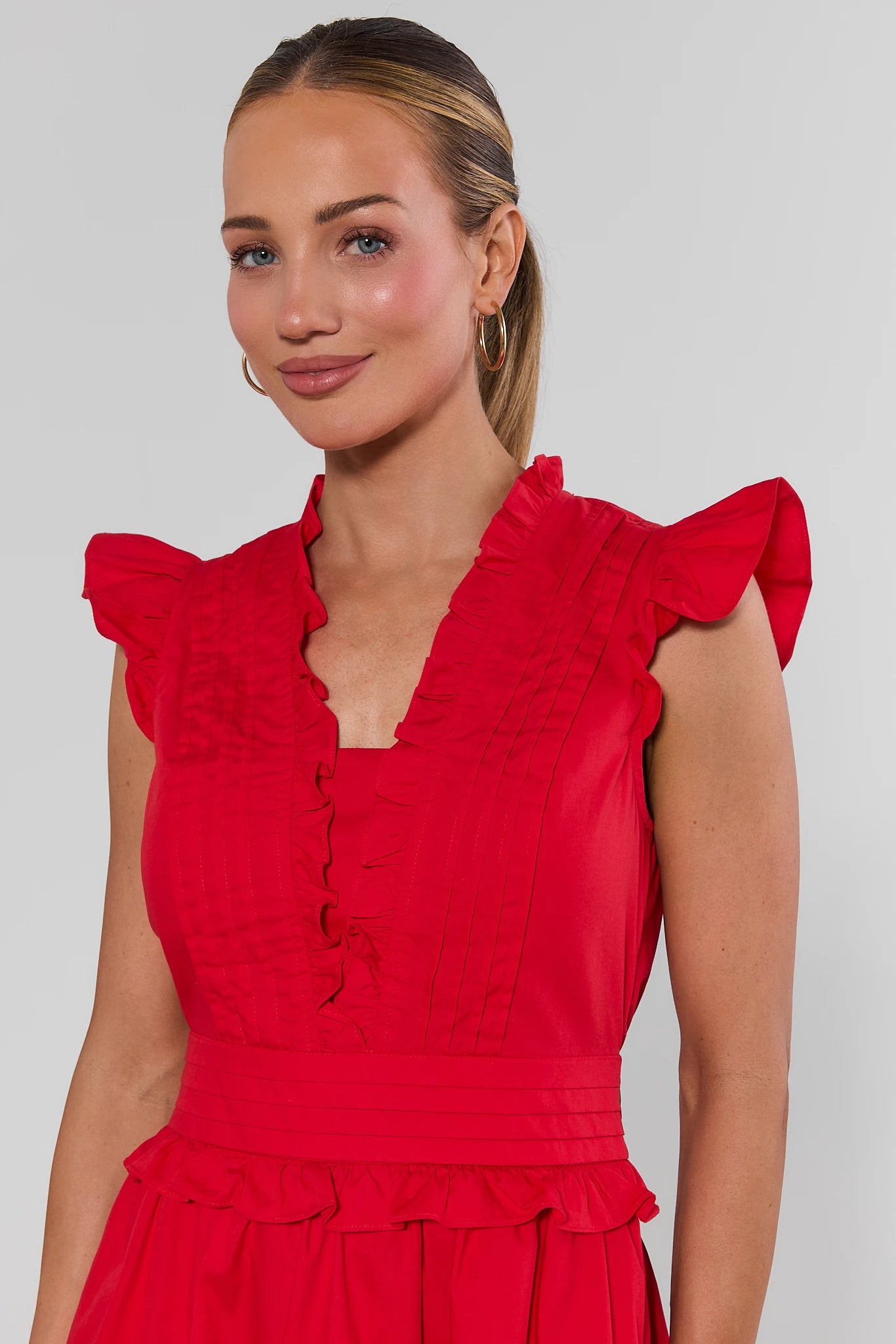 close up Woman wearing Makayla Red Flutter Sleeve Short Dress on a white background