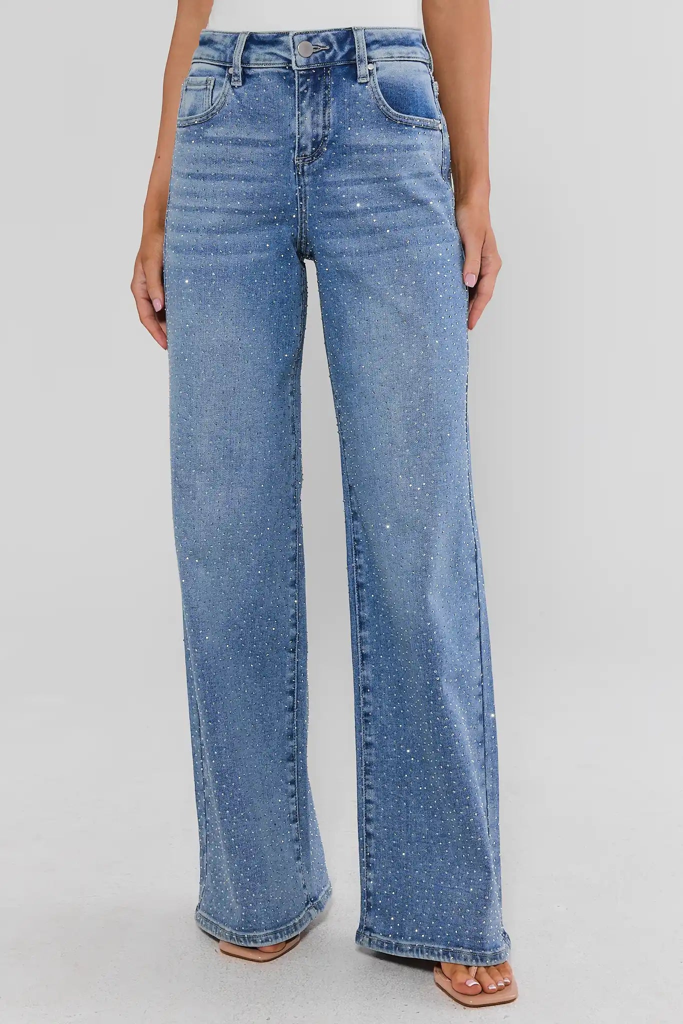 Woman wearing Carrie Rhinestone Wide Leg Jeans on a white background