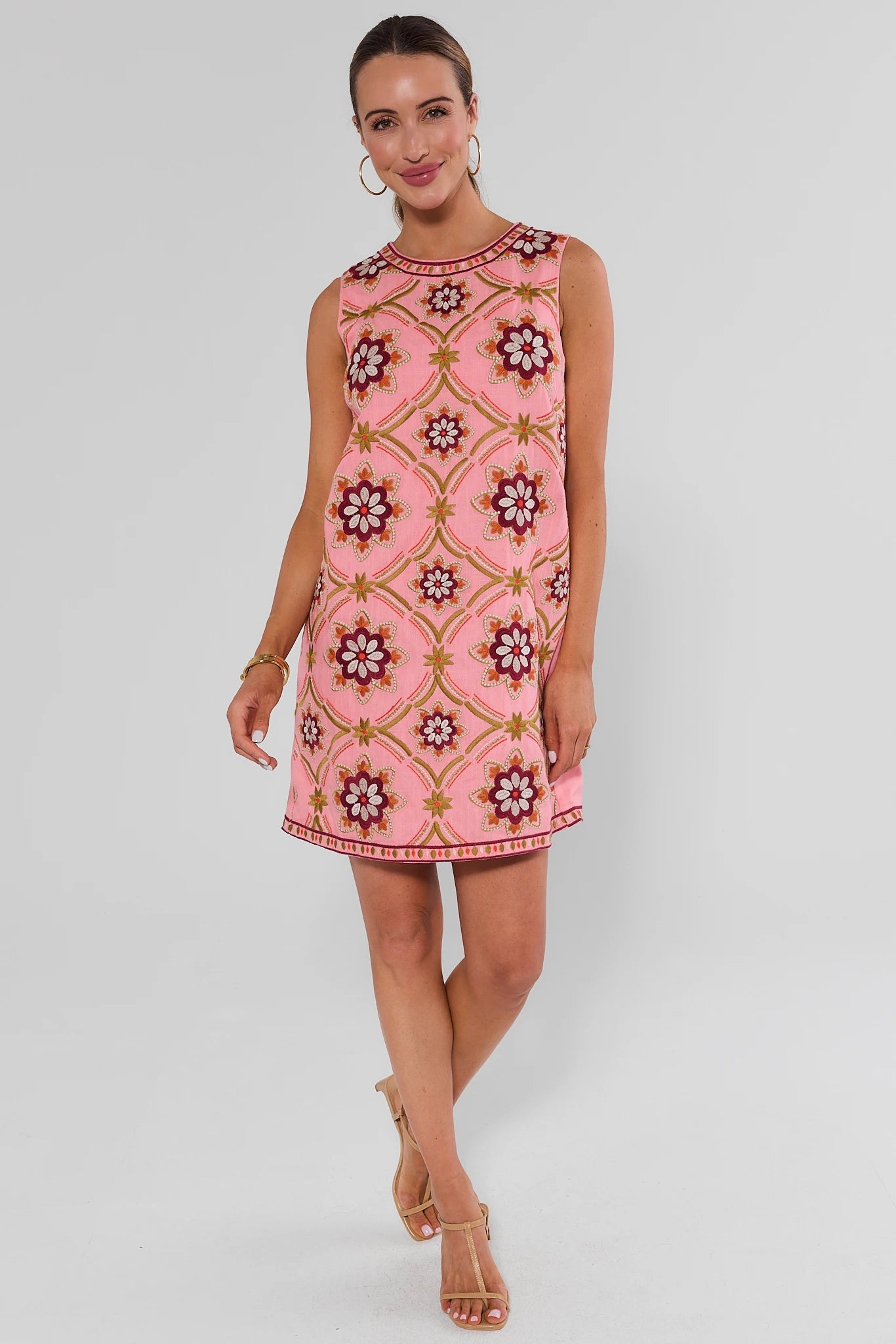Woman wearing Pink Embroidered Shift Dress by THML on a white background walking