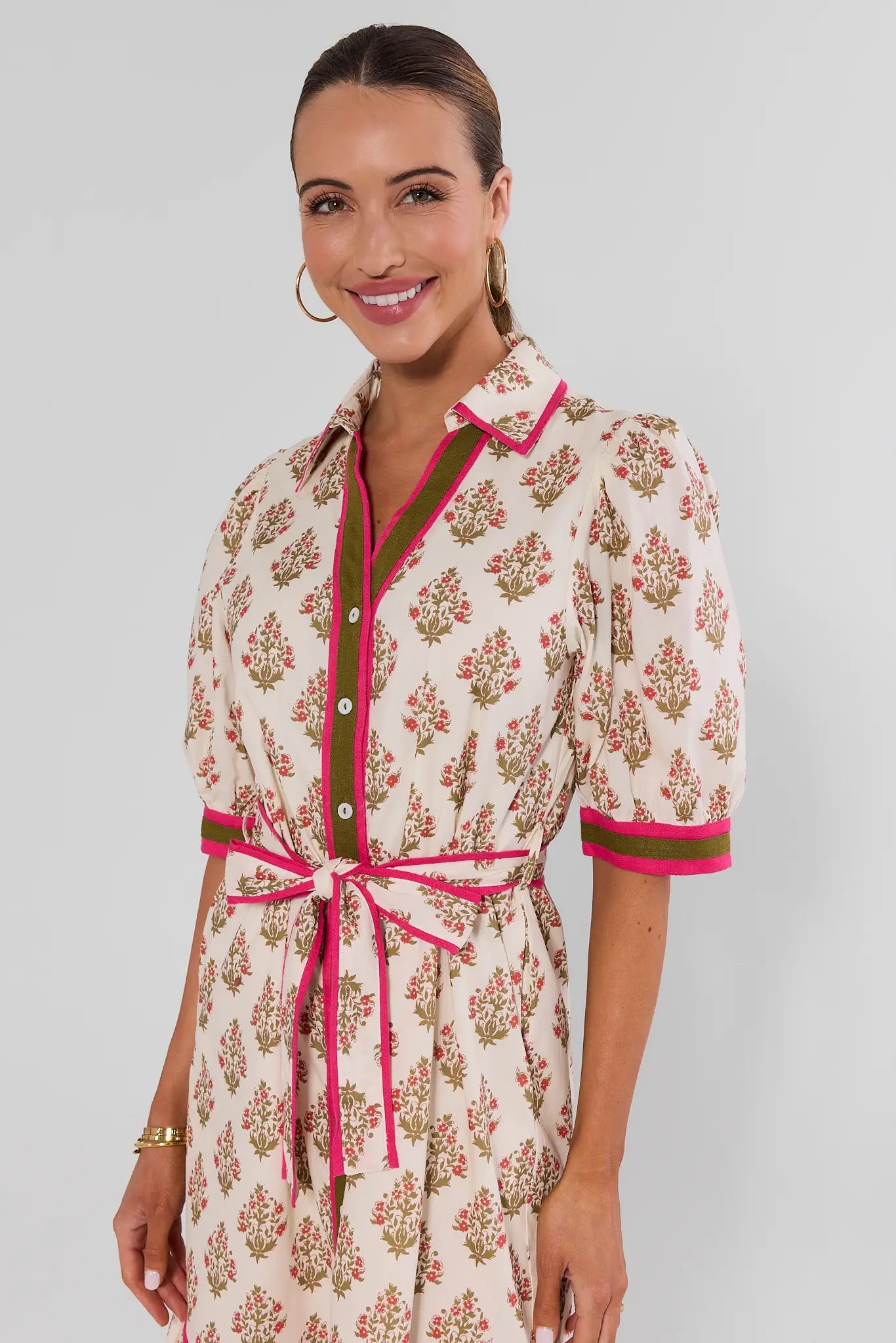 close up Woman wearing White Floral Button Up Midi Dress by THML on white background