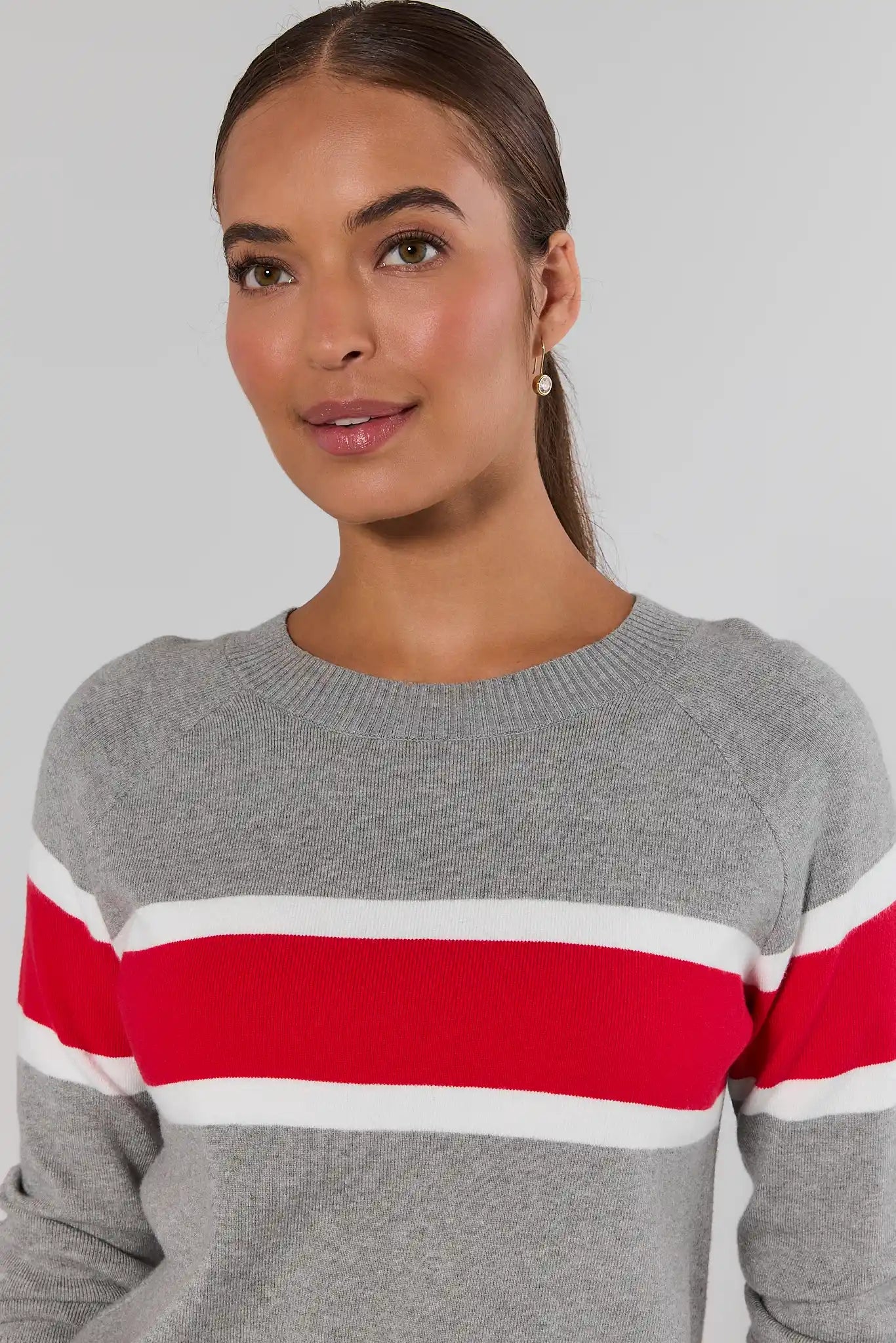 close up Woman wearing Dylan Red Stripe Sweater on a white background