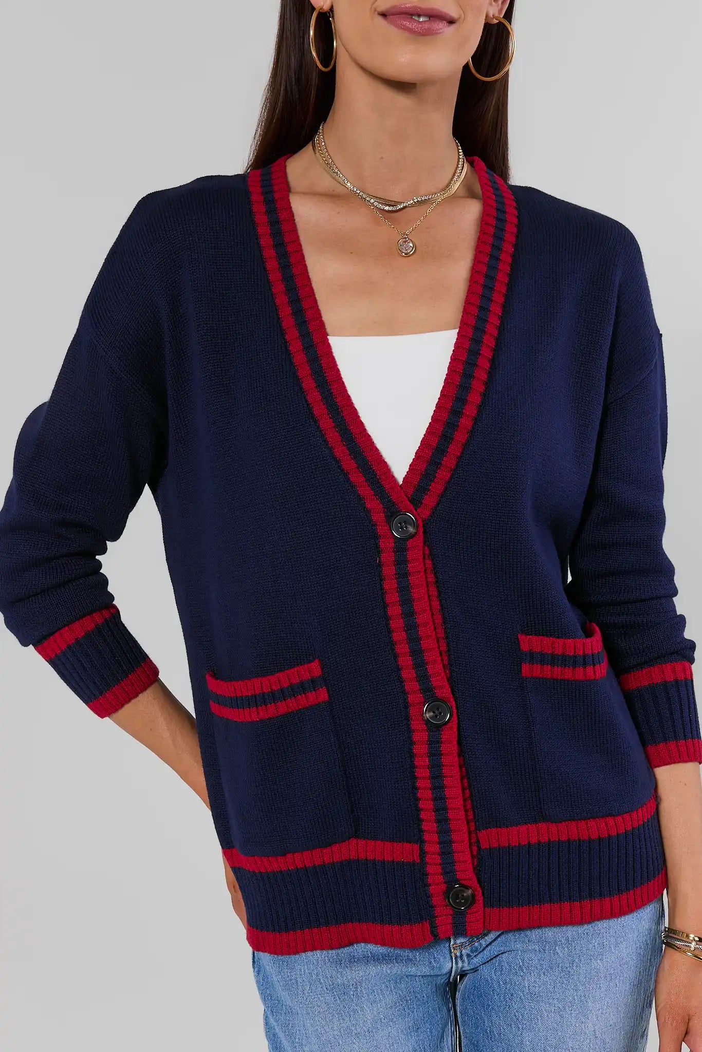 close up Woman wearing Navy Contrast Trim Applique Cardigan on a white background