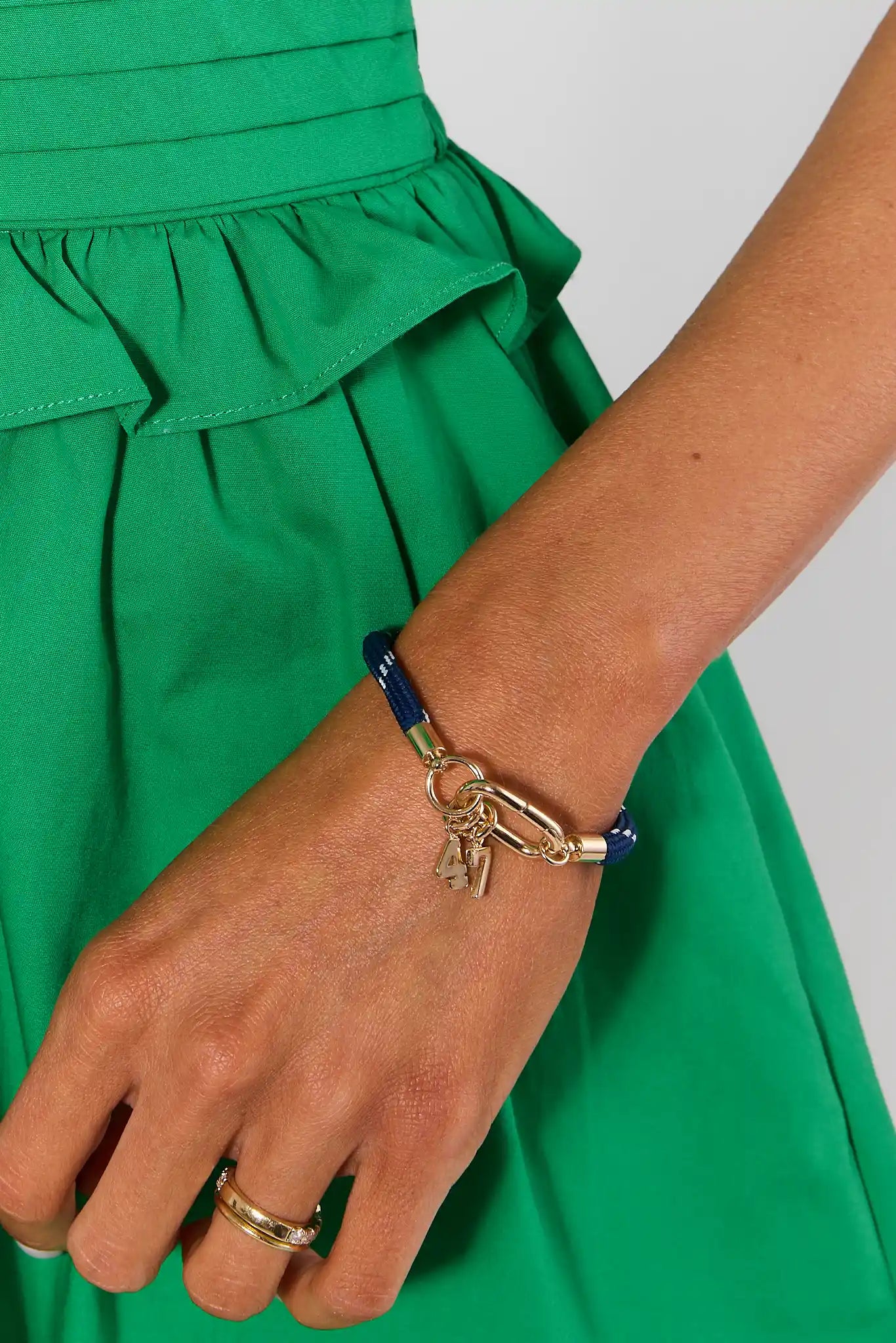 number charm number on a bracelet on a white background