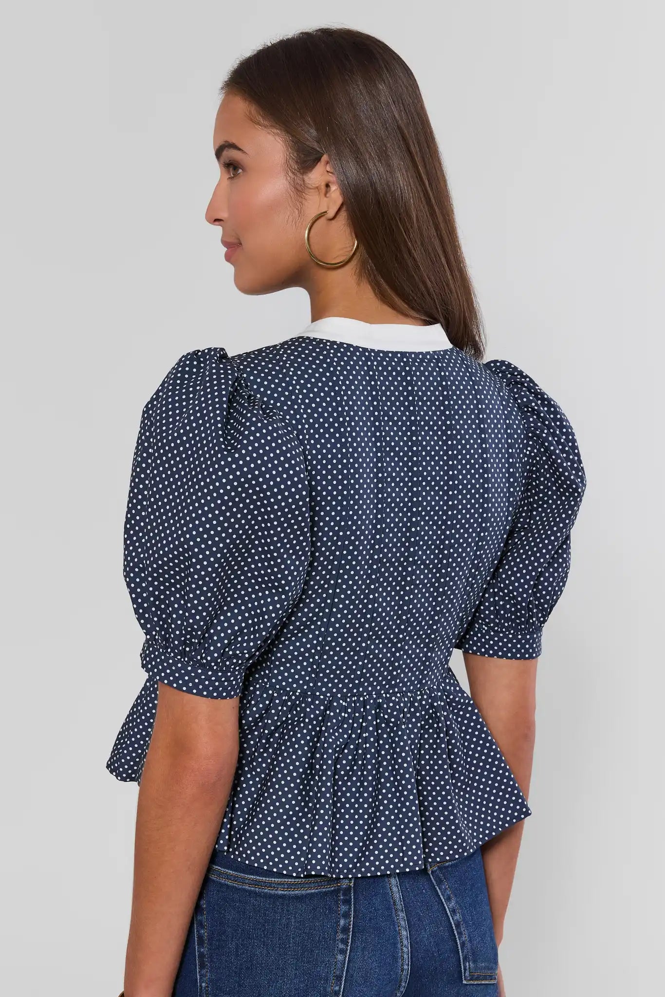 Navy Polka Dot Peplum Top