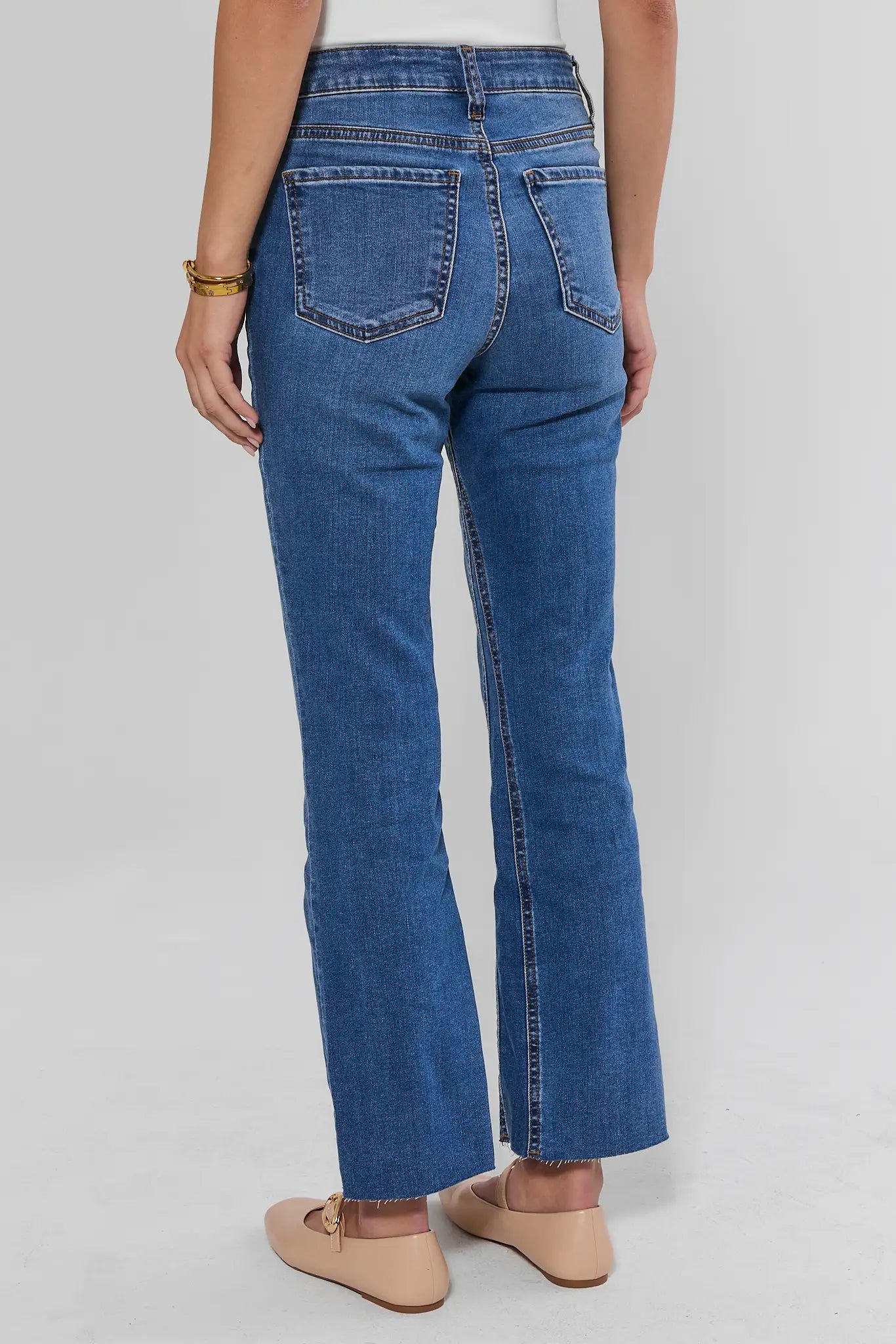 Kelsey Medium Kick Flare Jeans by KUT