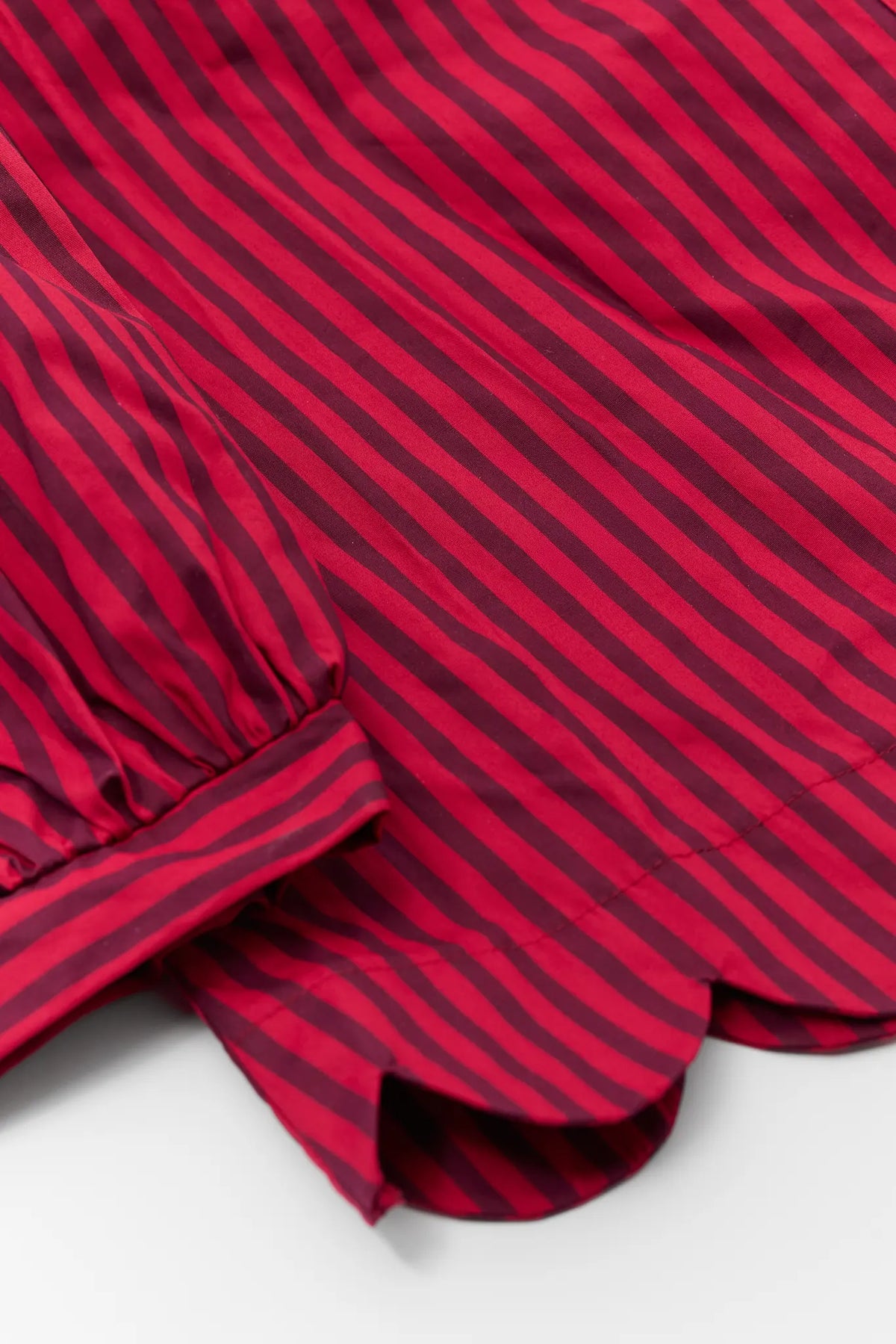Red Striped Top - Scalloped Hem & Fabric Texture Flat Lay Detail | Avara