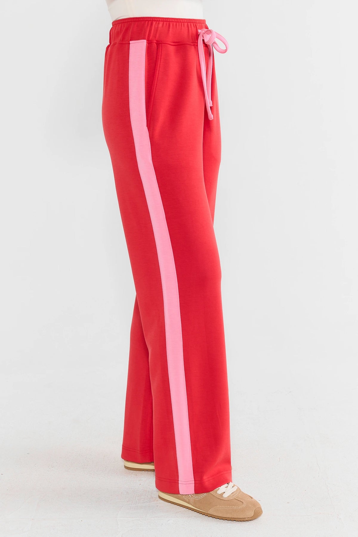 Red Wide-Leg Lounge Pants with Pink Side Stripe Detail - Side View On Model | Avara