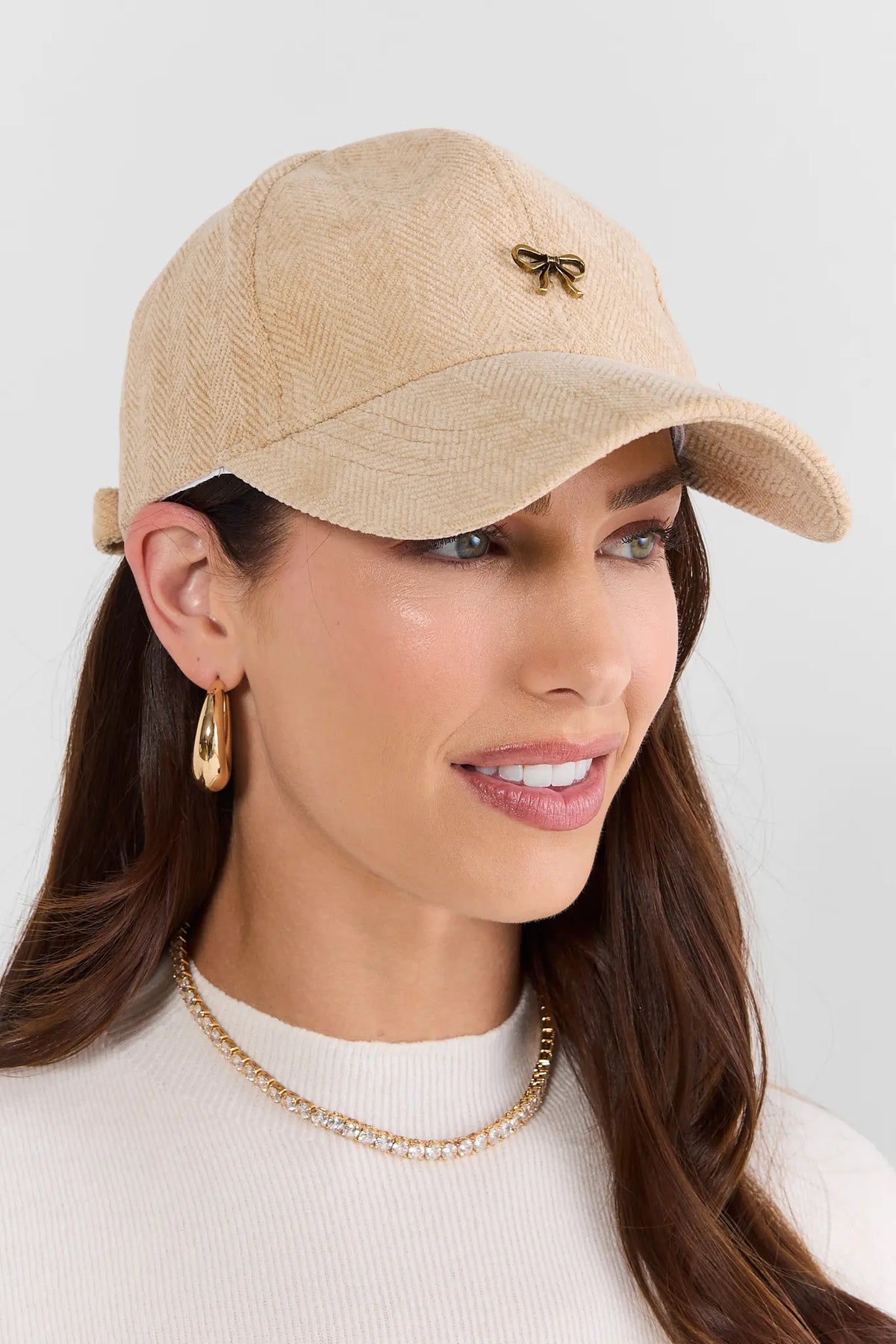 Tan Herringbone Baseball Cap with Bow Detail - On Model Front View | Avara