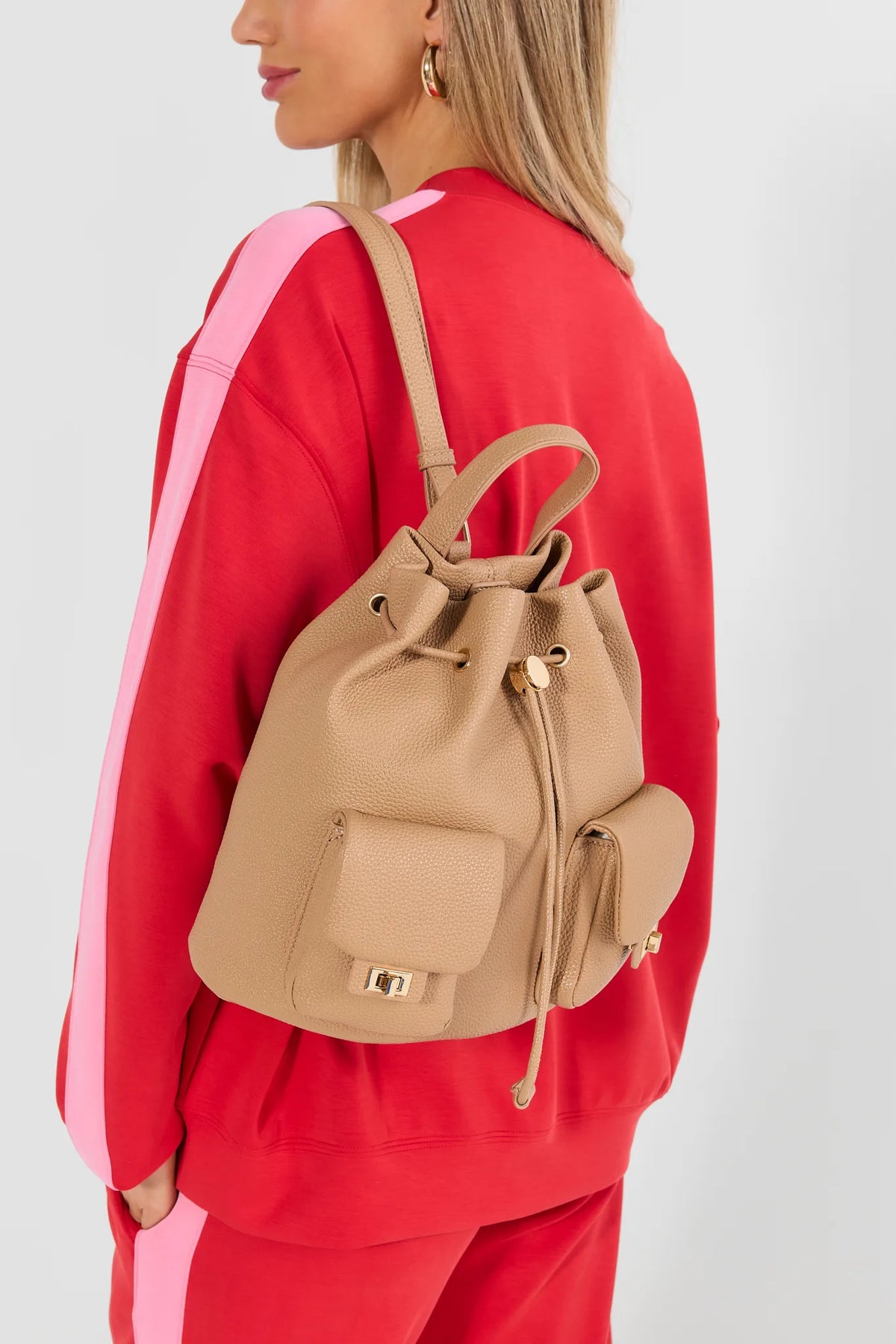 Tan Faux Leather Drawstring Backpack - On Model Side View | Avara
