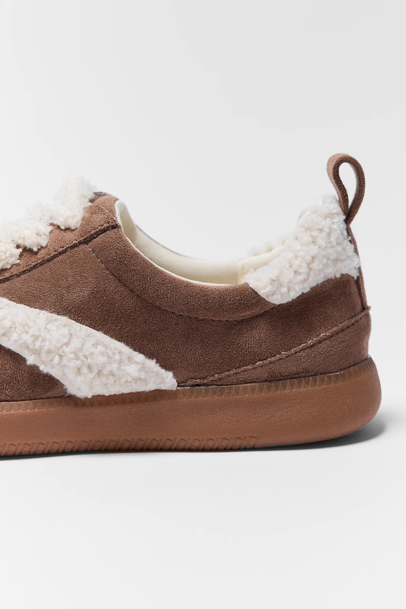 Brown sneaker with white shearling lining on a white background Winona Brown Sherpa Sneakers