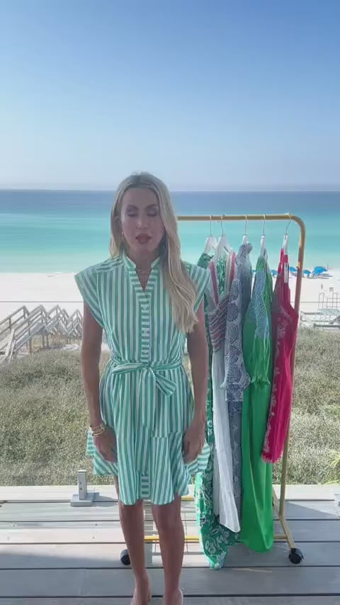 woman wearing erica dress with beach in background