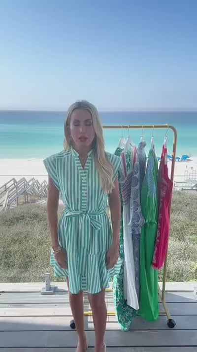 woman wearing erica dress with beach in background