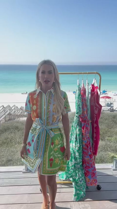 woman wearing alys dress with beach in background