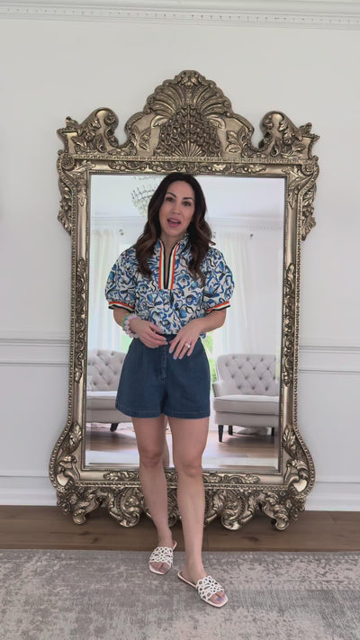 woman wearing vanessa blue top