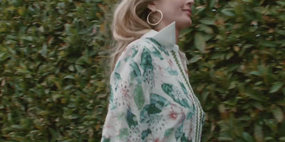 Avara Spring Collection video, women running through grass and flowers