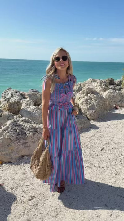 woman wearing margot blue striped maxi dress